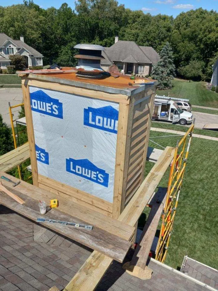 Cedar Siding Chimney Repair & Restoration – photo 1 of 5